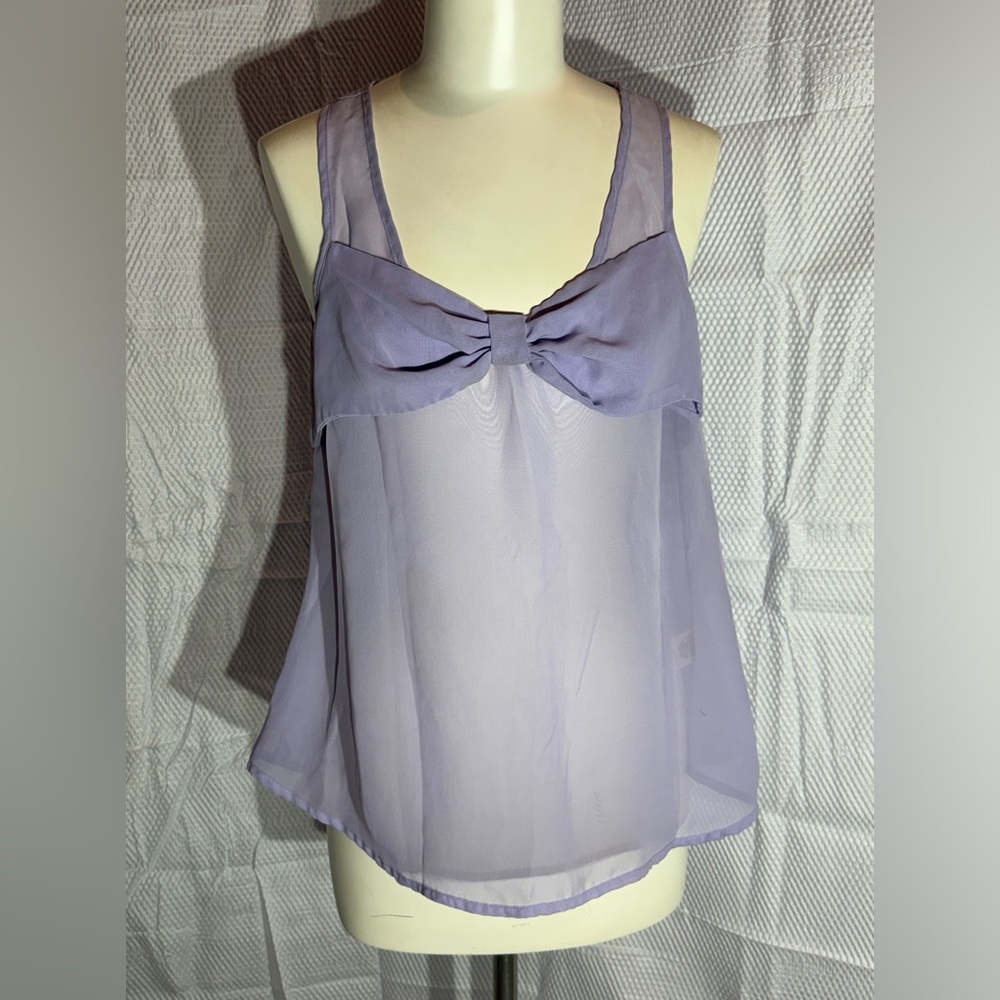 Cute lavender top is lightweight perfect for summer,  feels very soft and comfy